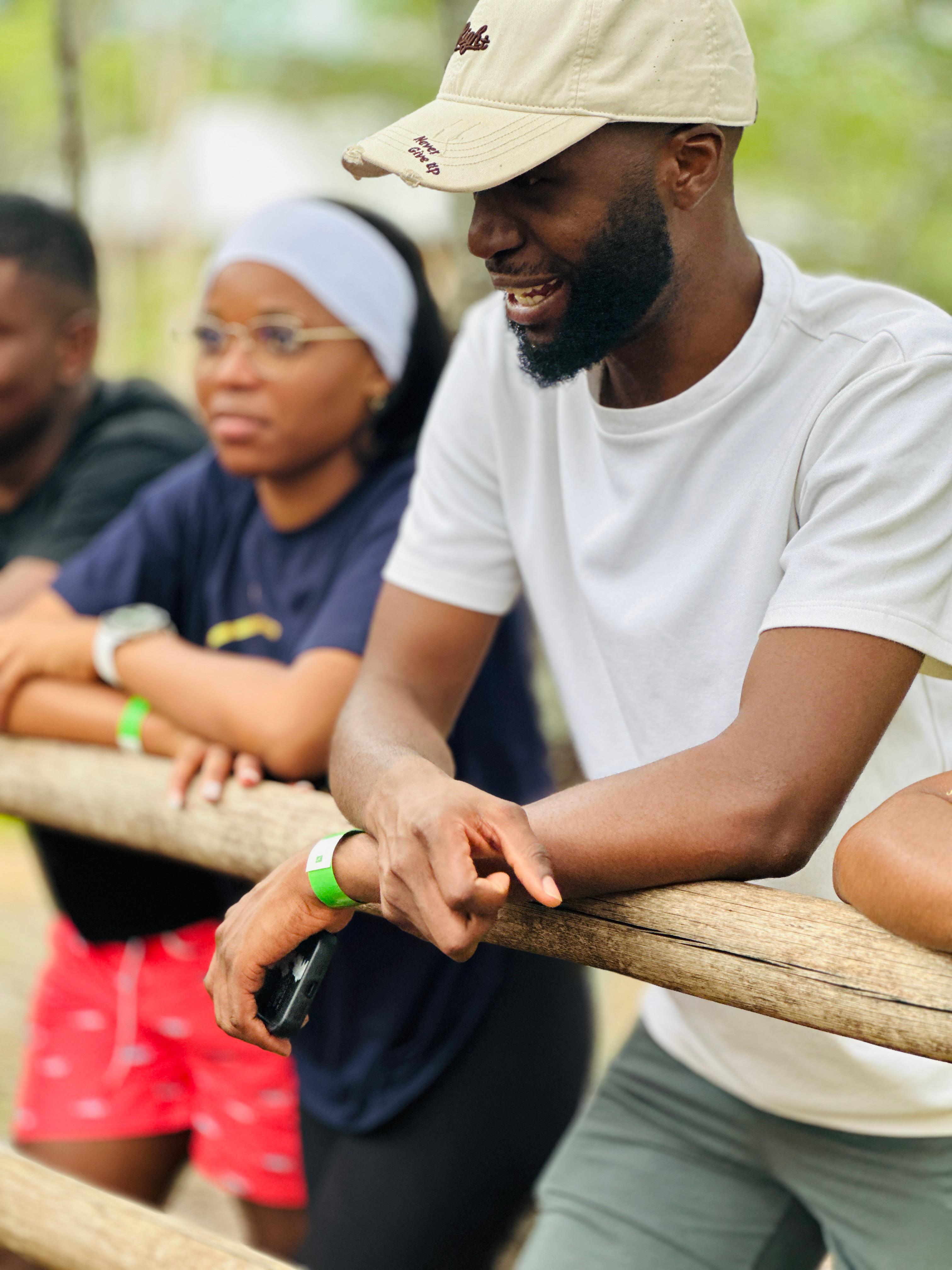 Camp participant laughing with friends during a break